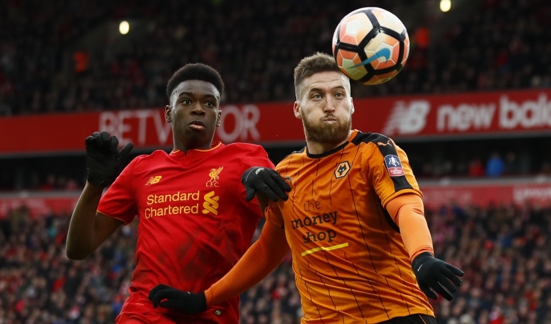 Britain Football Soccer - Liverpool v Wolverhampton Wanderers - FA Cup Fourth Round - Anfield - 28/1/17 Liverpool's Oviemuno Ejaria in action with Wolverhampton Wanderers' Matt Doherty Action Images via Reuters / Jason Cairnduff Livepic EDITORIAL USE ONLY. No use with unauthorized audio, video, data, fixture lists, club/league logos or "live" services. Online in-match use limited to 45 images, no video emulation. No use in betting, games or single club/league/player publications. Please contact your account representative for further details.